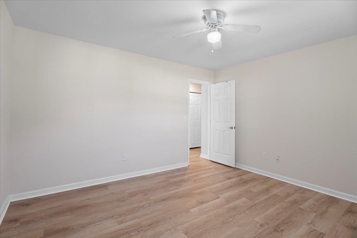 4420 Carter Road, Unit 33 St. Augustine, FL 32086 - Photo 14 of 20 wooden floor in an empty room