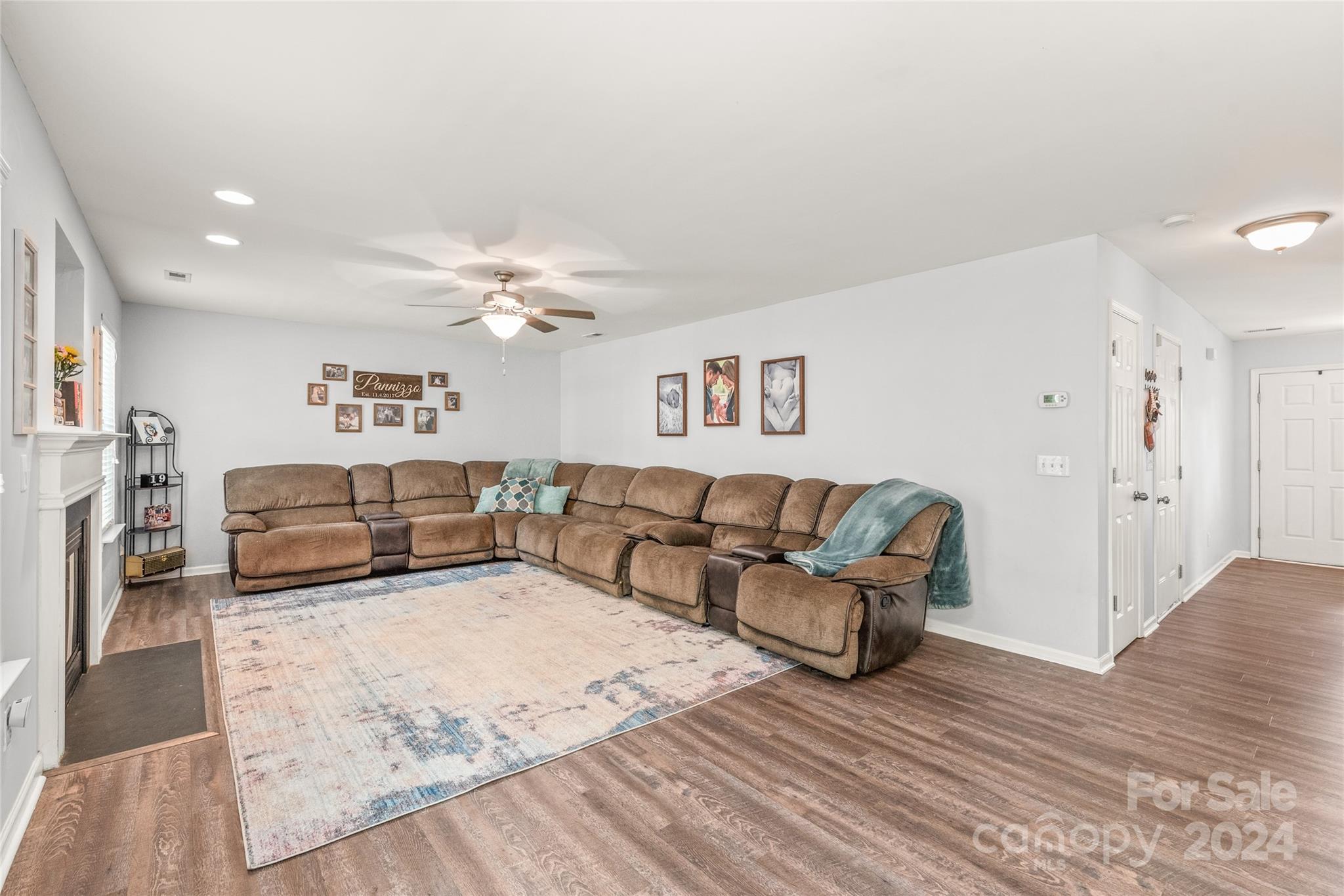 11616 Mud Drive Midland, NC 28107 - Photo 13 of 29 a living room with furniture and a chandelier