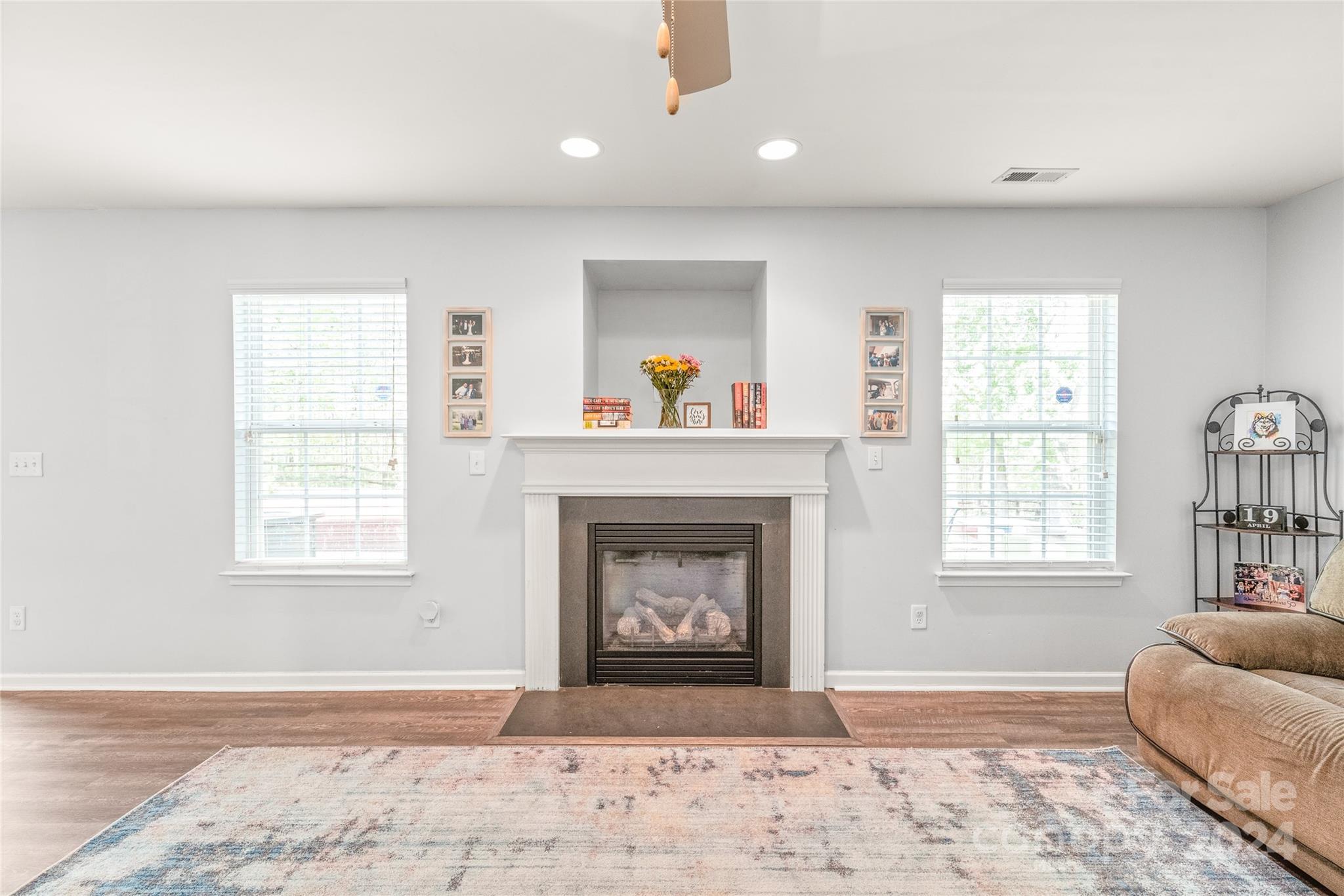11616 Mud Drive Midland, NC 28107 - Photo 14 of 29 a living room with furniture and a fireplace