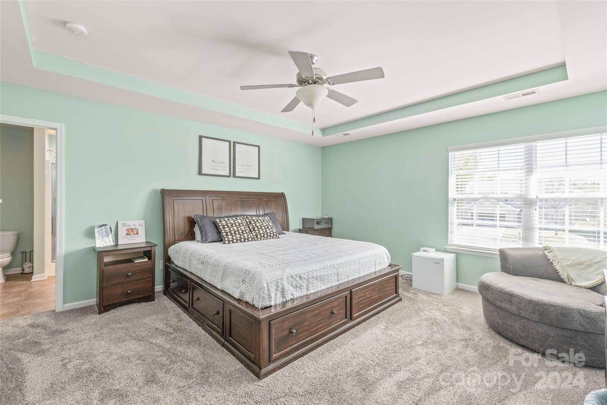 11616 Mud Drive Midland, NC 28107 - Photo 15 of 29 a bedroom with a bed couch and window