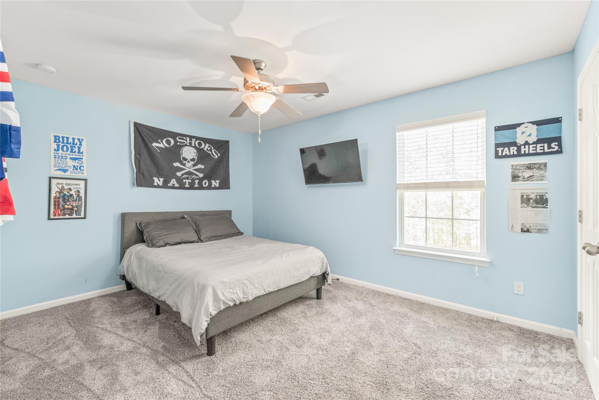 11616 Mud Drive Midland, NC 28107 - Photo 21 of 29 a bedroom with a large bed and a window