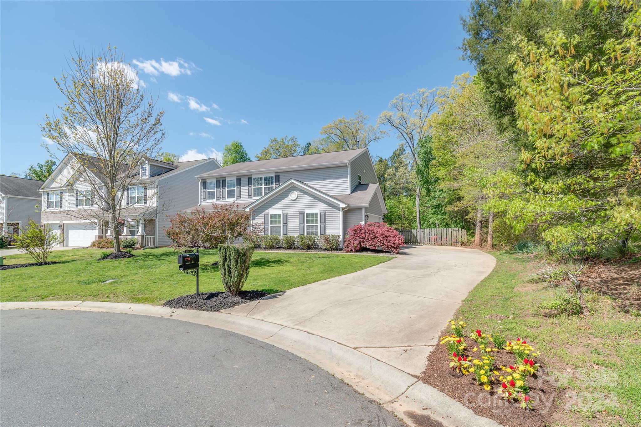 11616 Mud Drive Midland, NC 28107 - Photo 28 of 29 a front view of a house with garden
