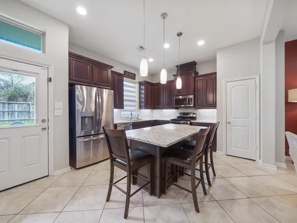 a living room with furniture or couch and a window