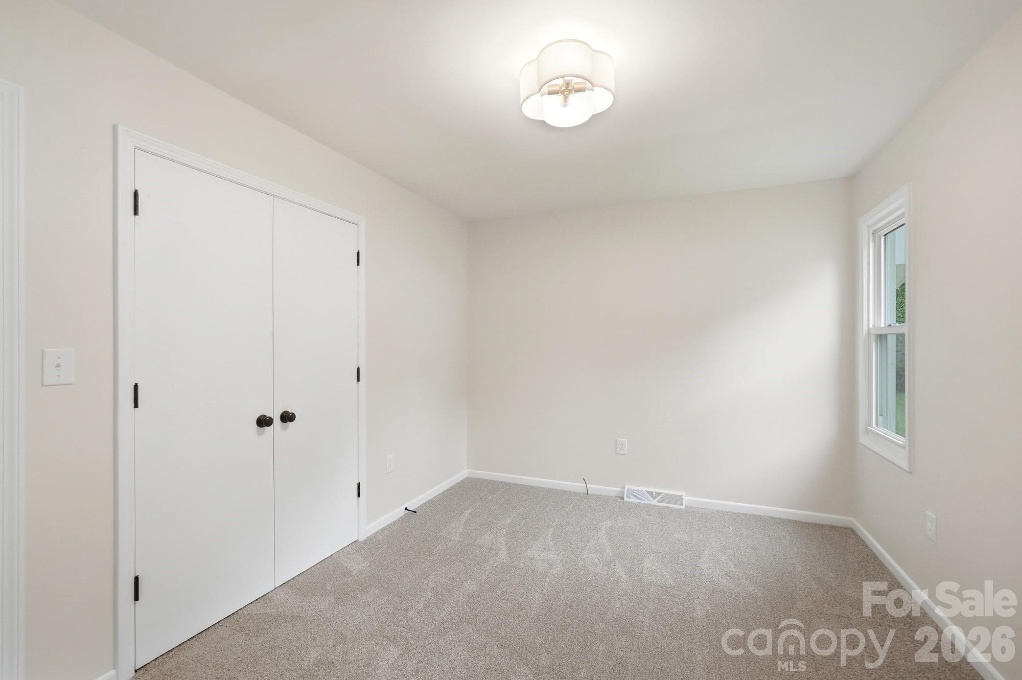 1235 Winecoff School Road Concord, NC 28027 - Photo 12 of 27 a view of an empty room