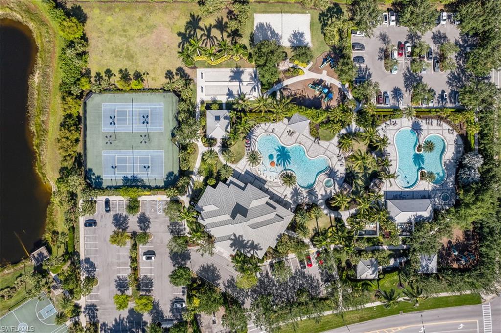 2767 Blossom Way Naples, FL 34120 - Photo 28 of 38 an aerial view of residential houses with outdoor space