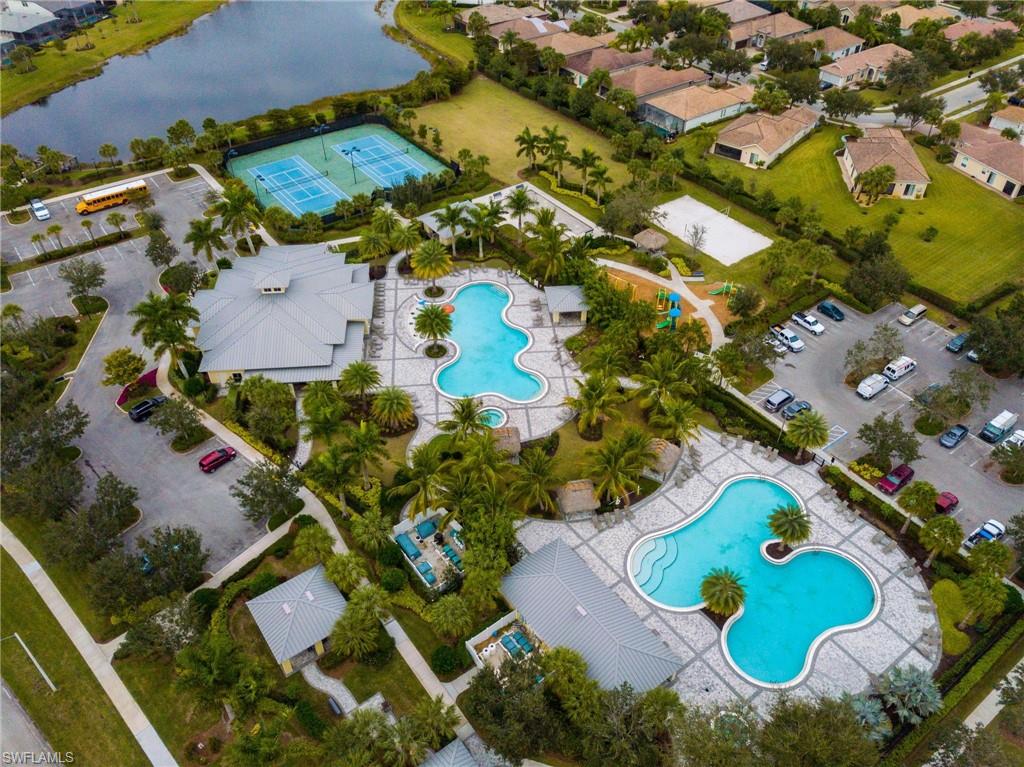 2767 Blossom Way Naples, FL 34120 - Photo 29 of 38 an aerial view of a house