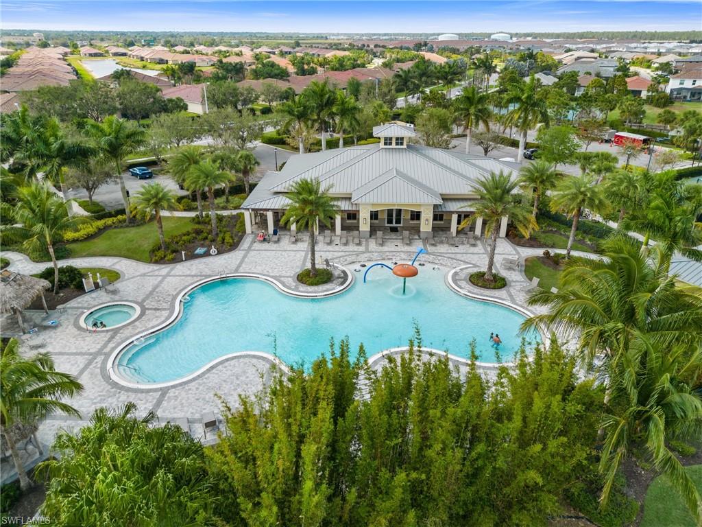 2767 Blossom Way Naples, FL 34120 - Photo 30 of 38 an aerial view of residential houses with outdoor space