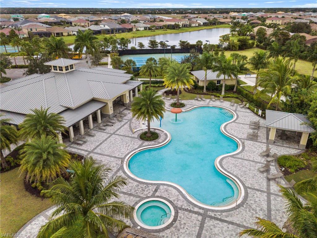2767 Blossom Way Naples, FL 34120 - Photo 33 of 38 an aerial view of a house with outdoor space