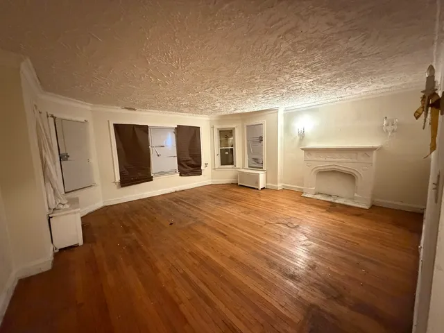 a view of a livingroom with a fireplace