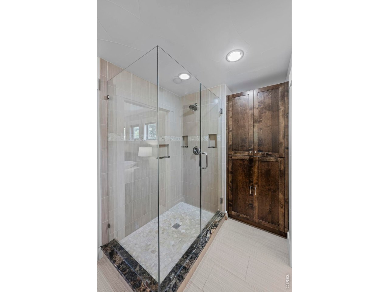 4824 Briar Ridge Court Boulder, CO 80301 - Photo 16 of 40 a bathroom with a shower and a sink