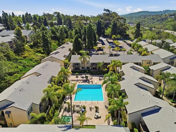 an aerial view of a house with a garden