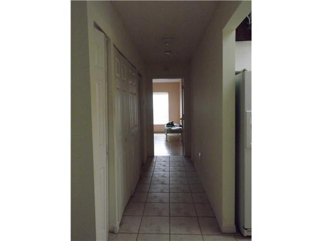 8410 Southwest 157th Court Miami, FL 33193 - Photo 12 of 15 a hallway with front door