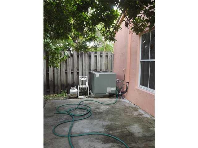 8410 Southwest 157th Court Miami, FL 33193 - Photo 14 of 15 a room with furniture and a potted plant