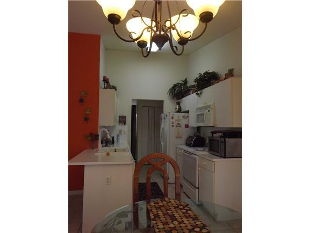 8410 Southwest 157th Court Miami, FL 33193 - Photo 5 of 15 a bathroom with a sink and a mirror