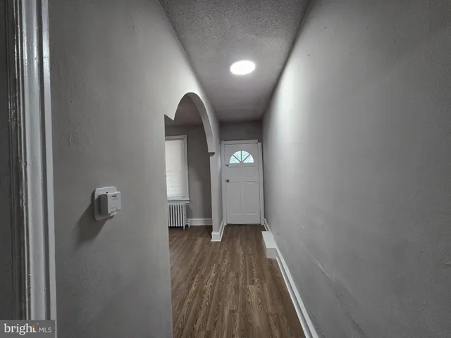 a view of a livingroom with wooden floor