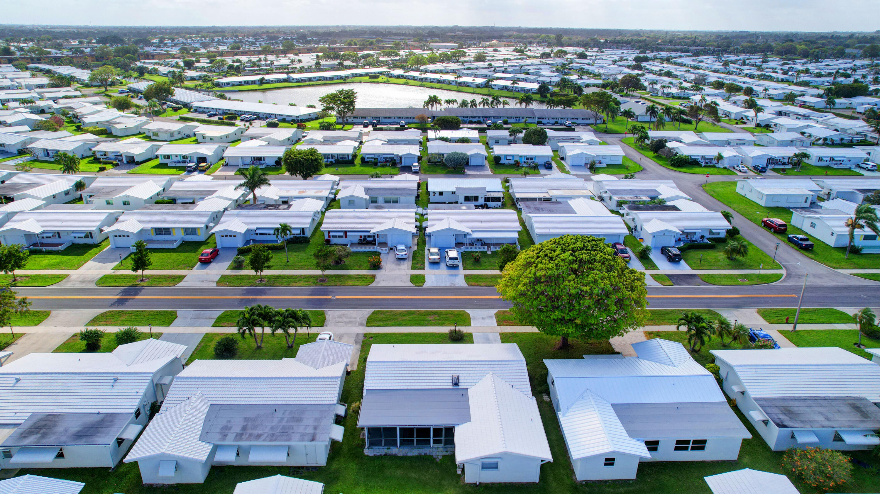 716 Southwest 18th Street Boynton Beach, FL 33426 - Photo 13 of 65 an aerial view of a city with lots of residential buildings