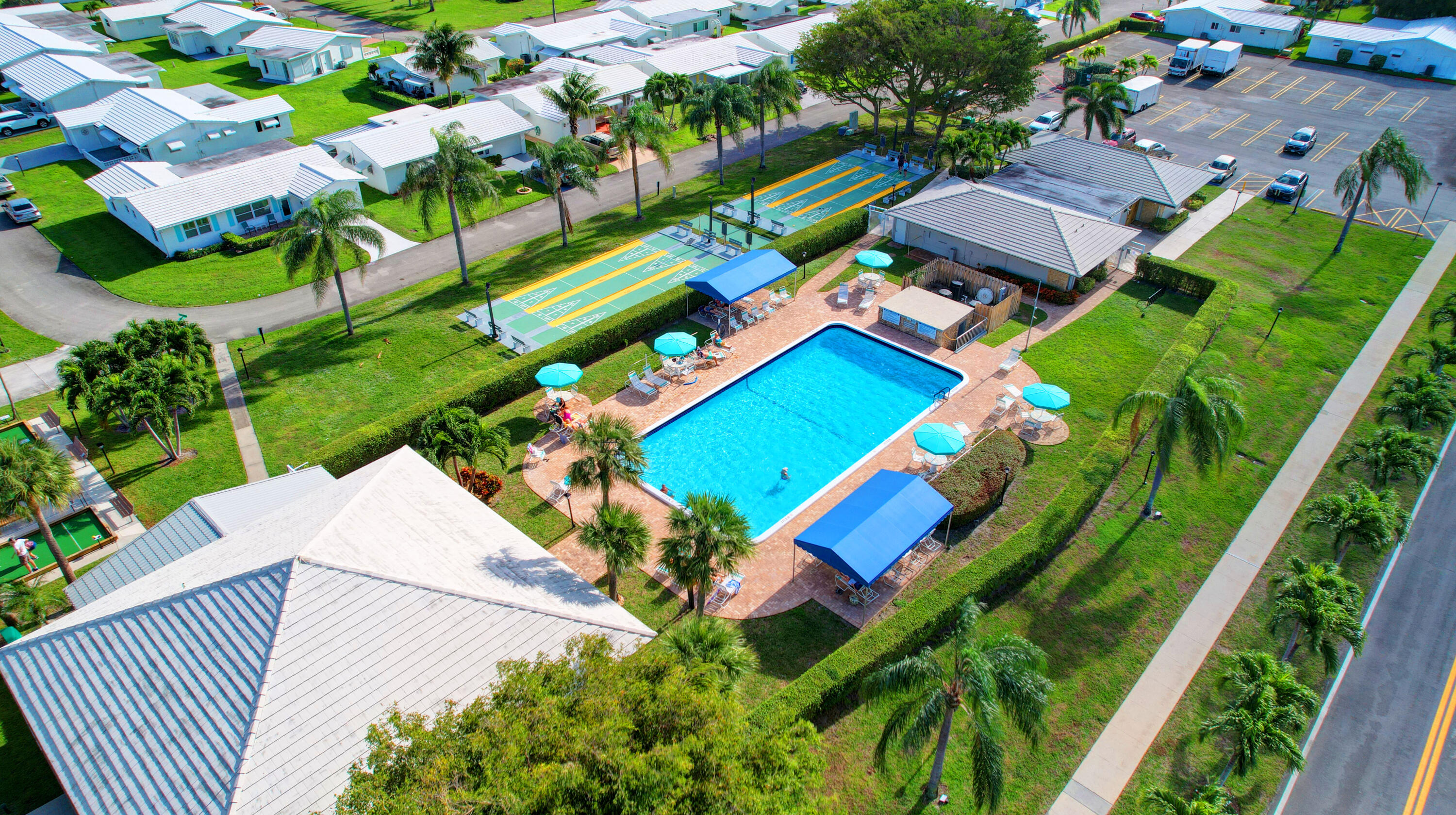 716 Southwest 18th Street Boynton Beach, FL 33426 - Photo 15 of 65 an aerial view of residential house with outdoor space and swimming pool