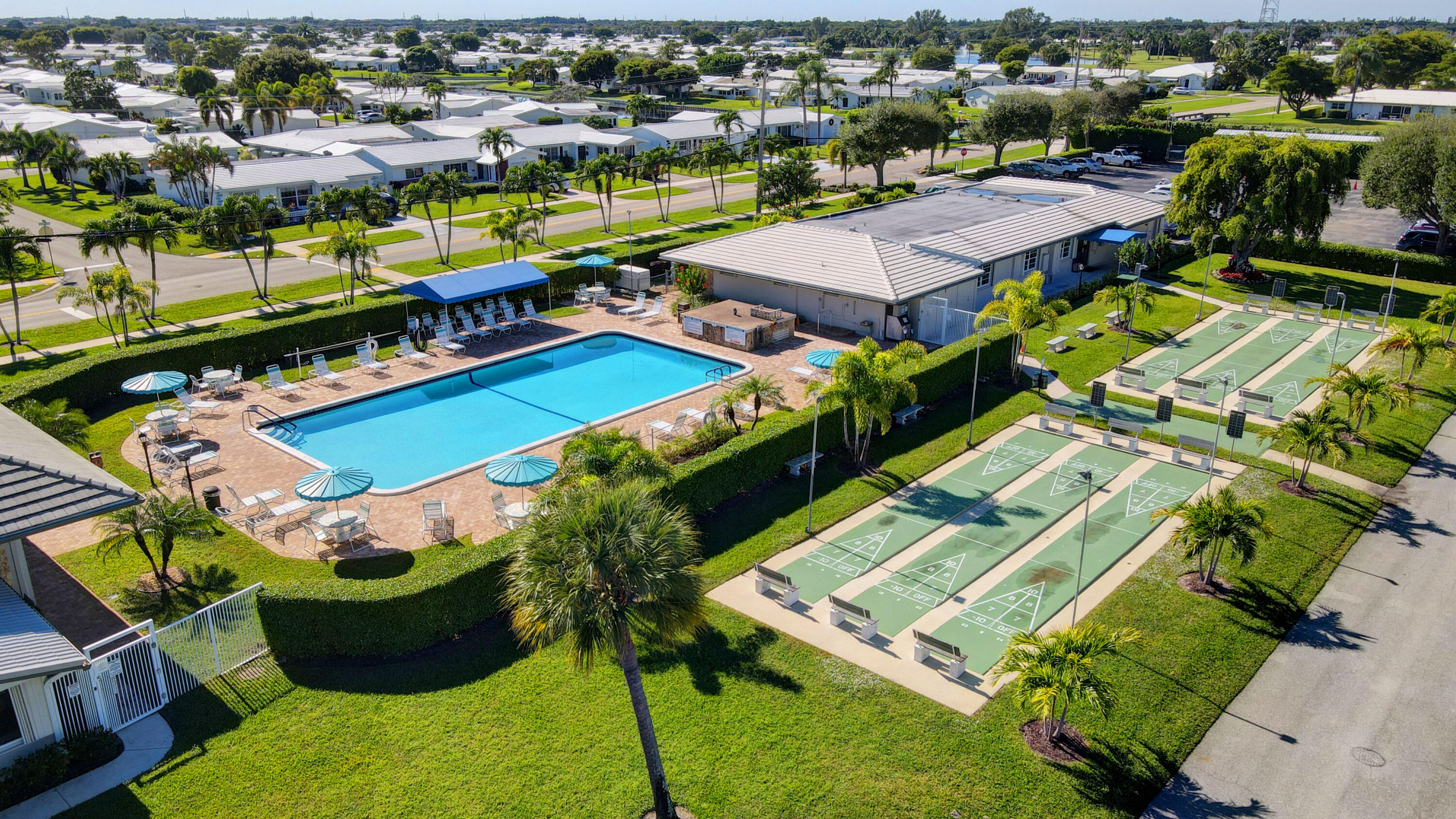 716 Southwest 18th Street Boynton Beach, FL 33426 - Photo 20 of 65 an aerial view of residential houses with outdoor space