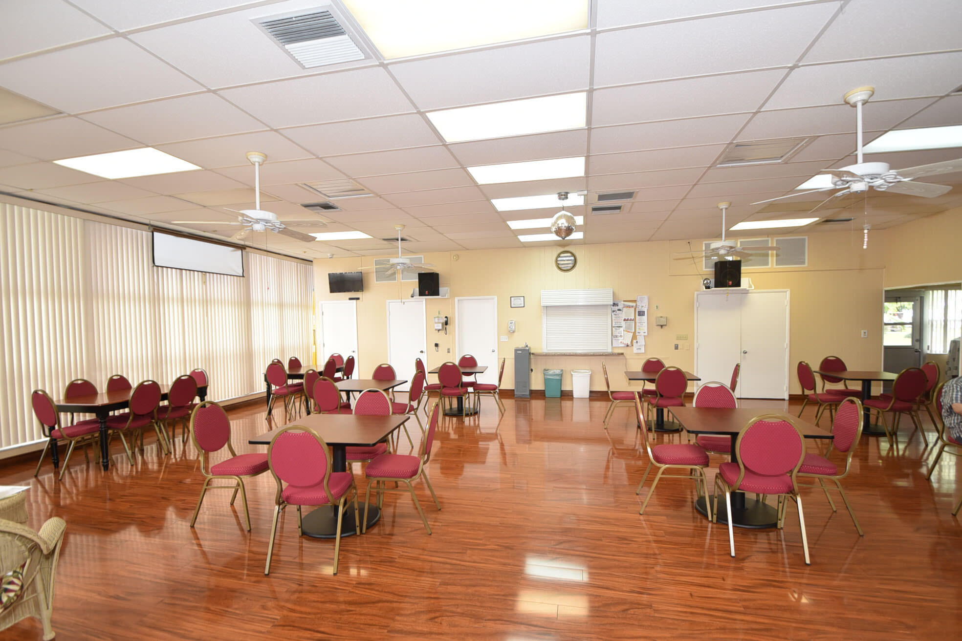 716 Southwest 18th Street Boynton Beach, FL 33426 - Photo 28 of 65 a room with lots of chairs and dining table