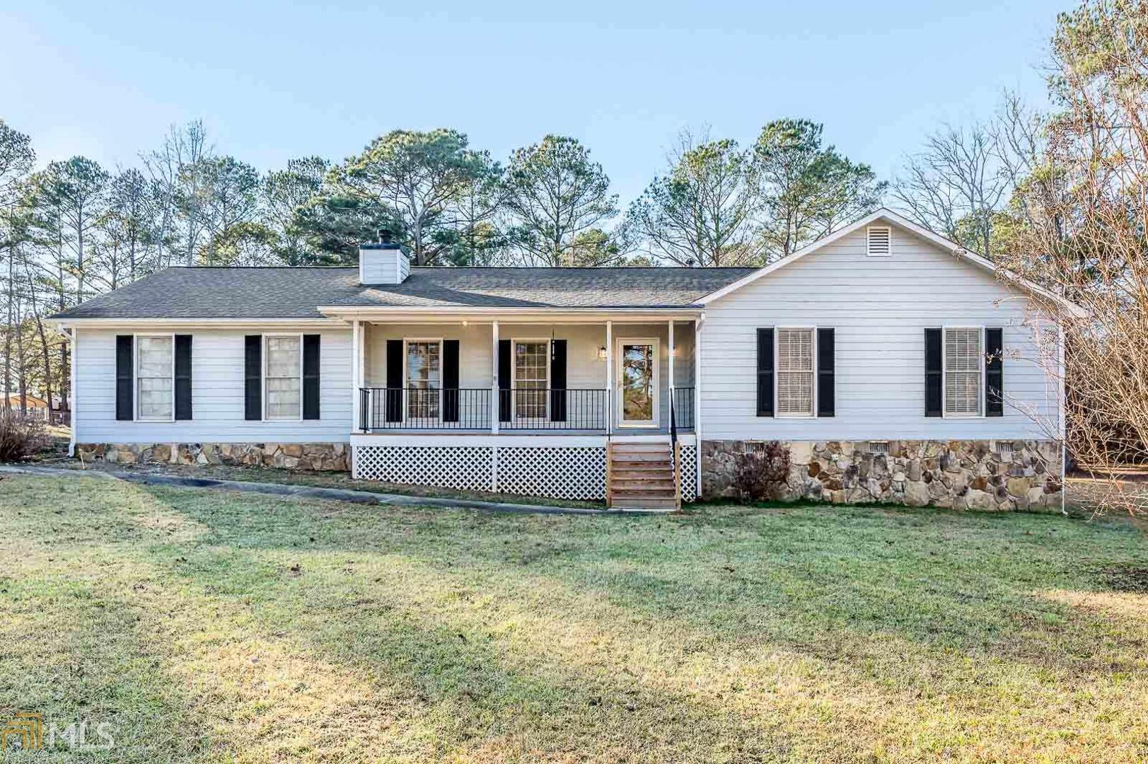 323 Fannin Road Griffin, GA 30223 - Photo 1 of 1 a view of a house with a yard