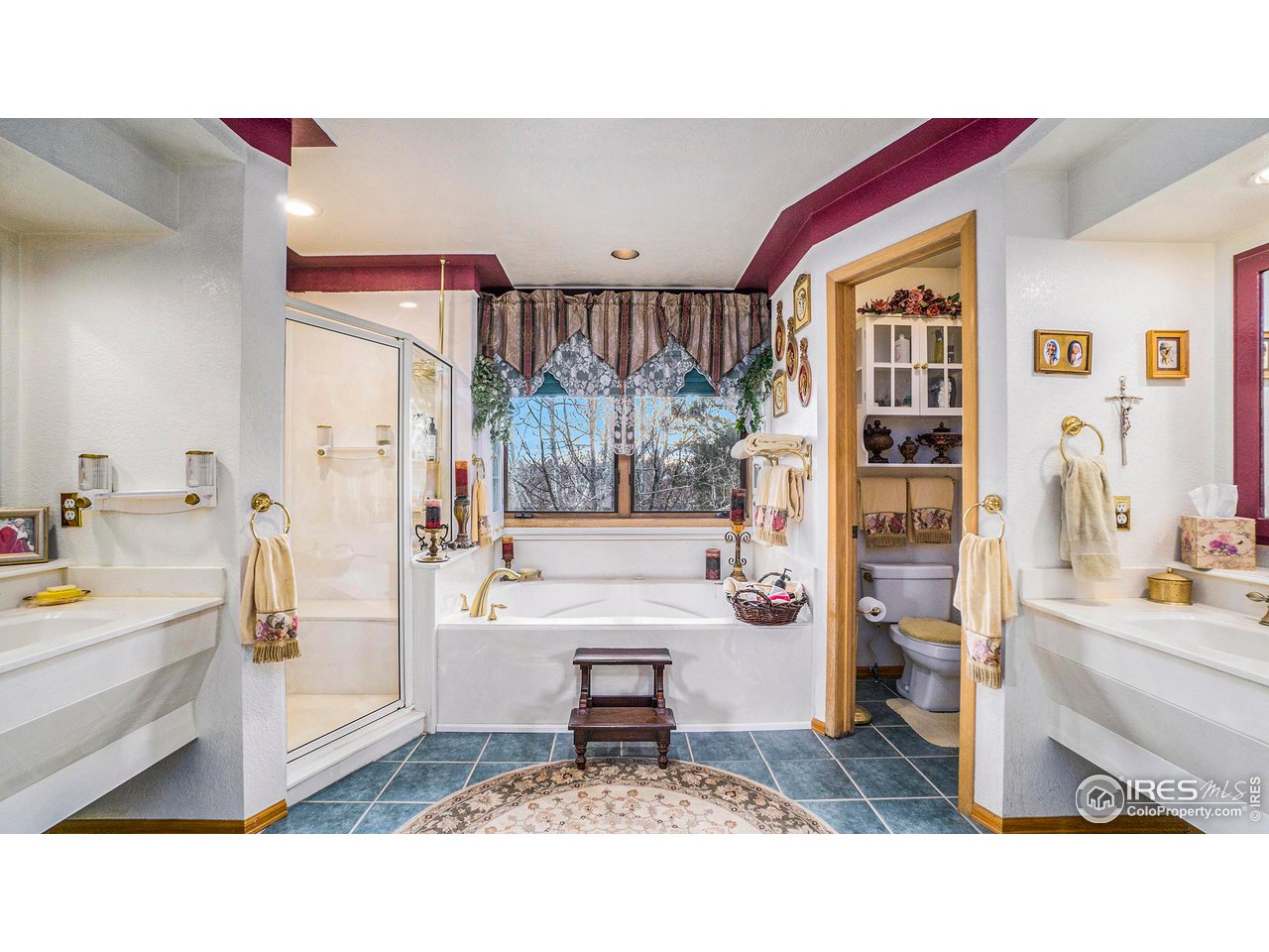 4328 West 14th Street Road Greeley, CO 80634 - Photo 16 of 30 a living room with furniture and a book shelf