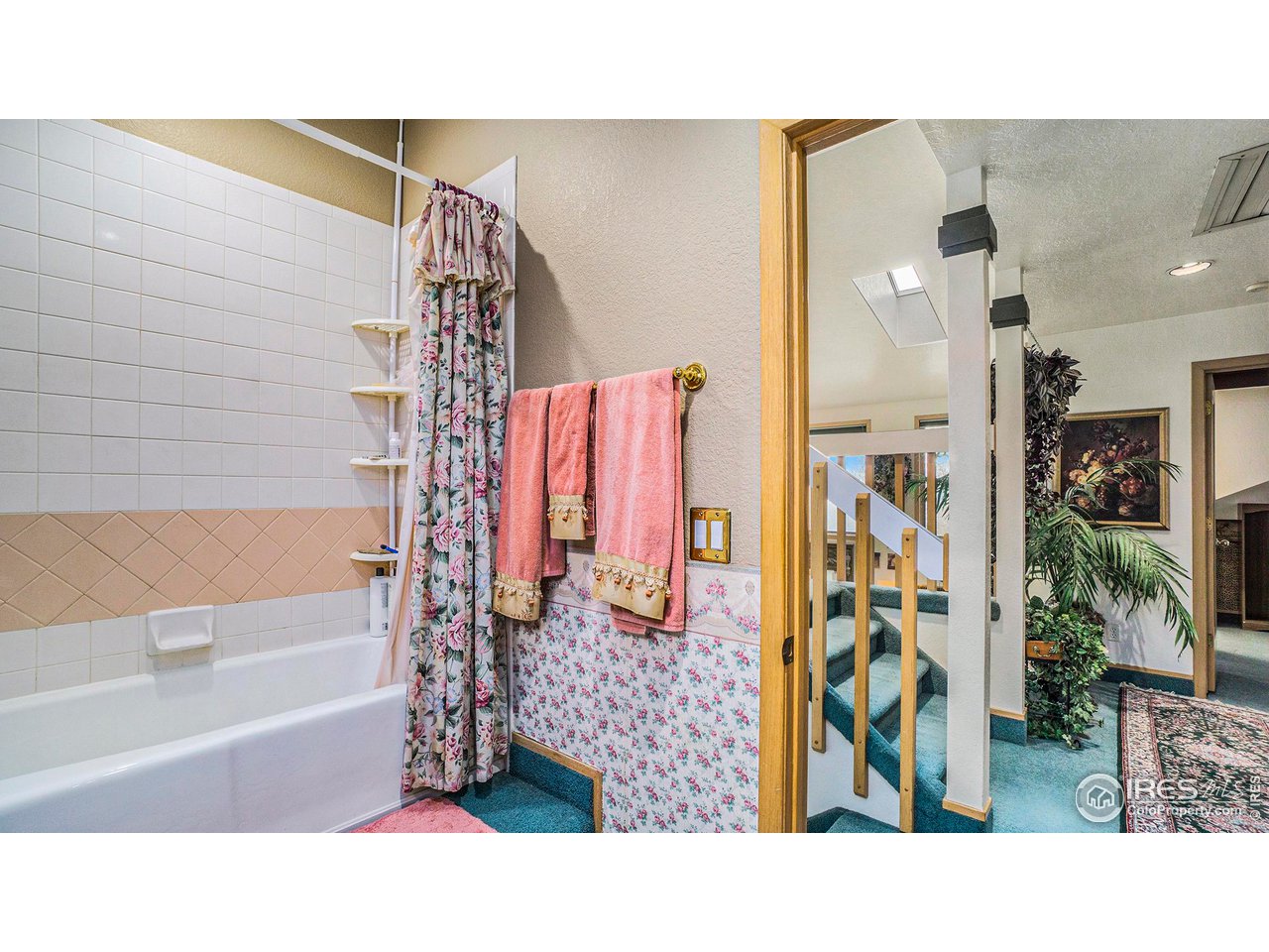 4328 West 14th Street Road Greeley, CO 80634 - Photo 20 of 30 a bathroom with a bathtub and a shower
