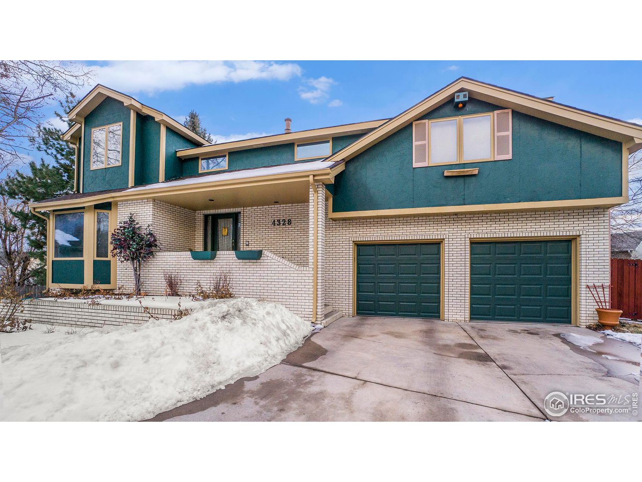 4328 West 14th Street Road Greeley, CO 80634 - Photo 2 of 30 a house view with a outdoor space