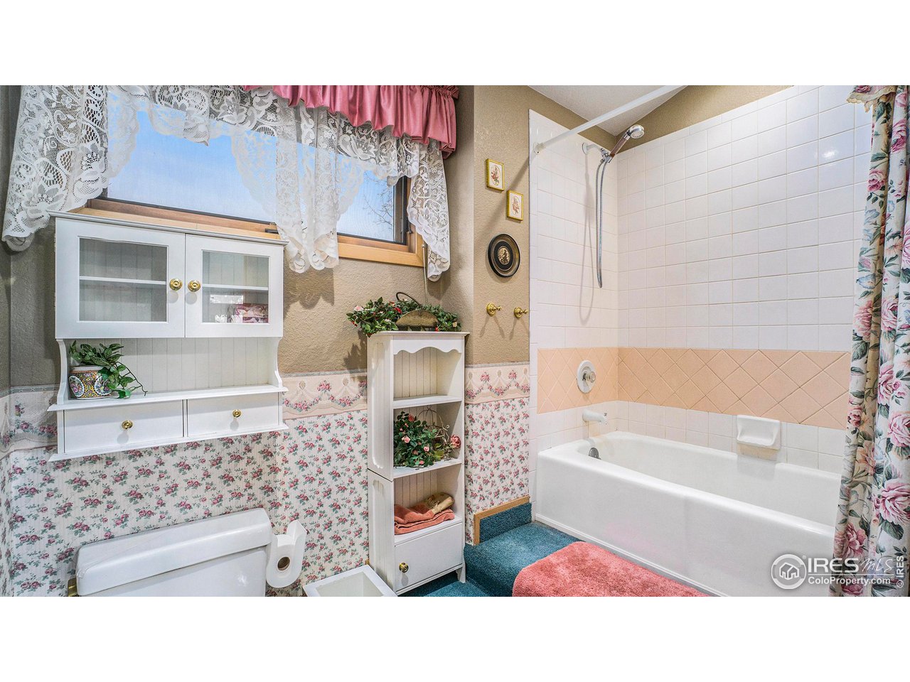 4328 West 14th Street Road Greeley, CO 80634 - Photo 21 of 30 a bathroom with a tub sink and shower