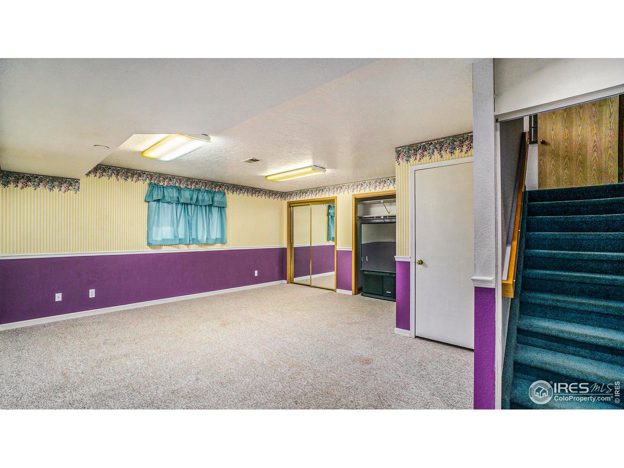 4328 West 14th Street Road Greeley, CO 80634 - Photo 22 of 30 a open hall with stairs