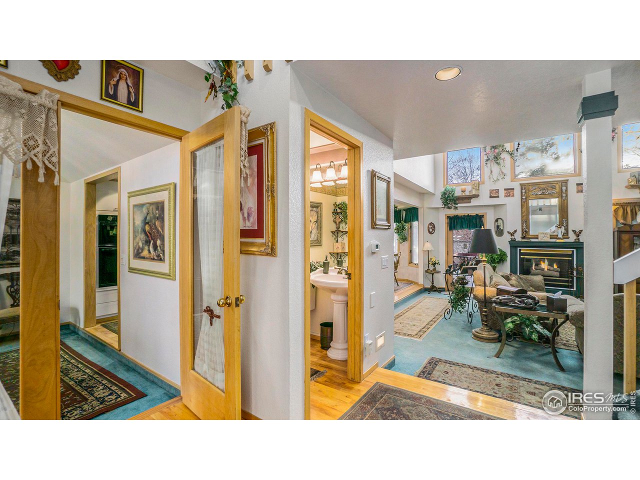 4328 West 14th Street Road Greeley, CO 80634 - Photo 3 of 30 a open living room filled with furniture