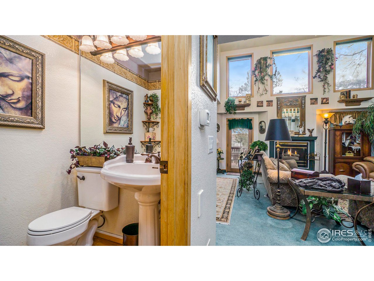 4328 West 14th Street Road Greeley, CO 80634 - Photo 4 of 30 a bathroom with a toilet a sink and mirror