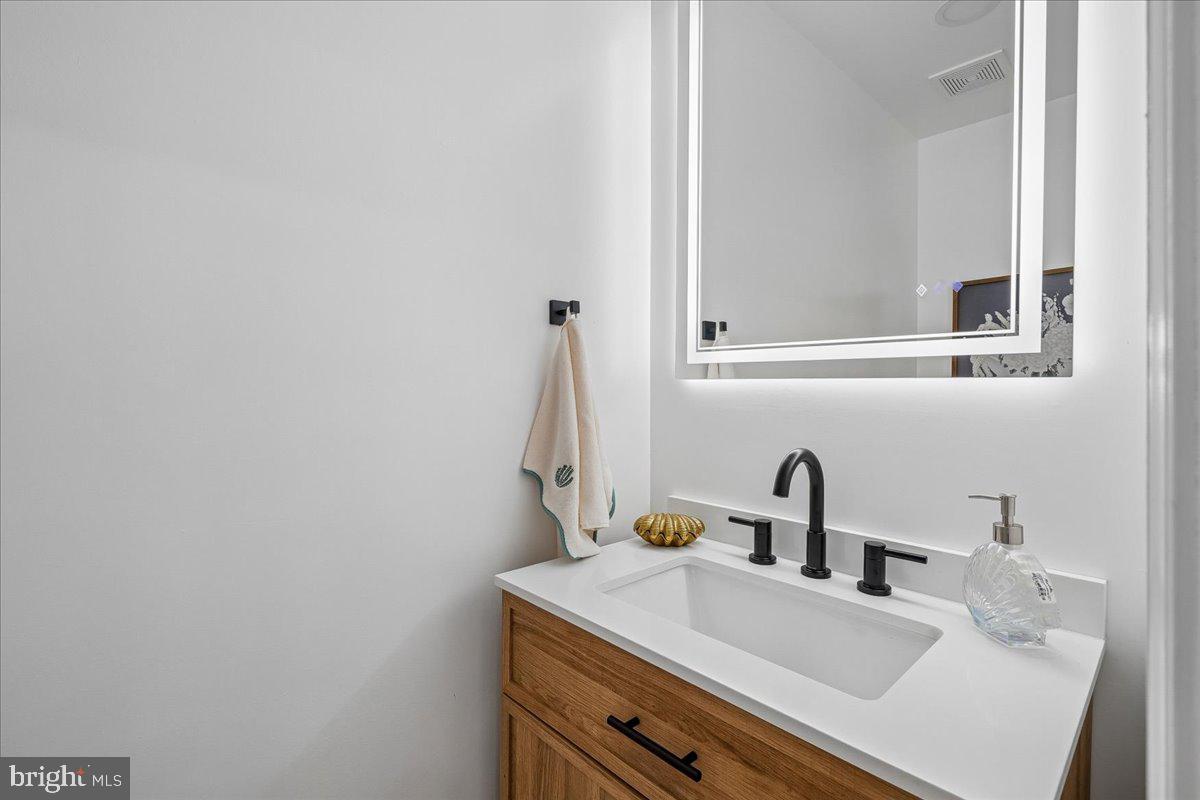 100 Rugby Fredericksburg, VA 22406 - Photo 36 of 41 Sleek modern bathroom with elegant fixtures.