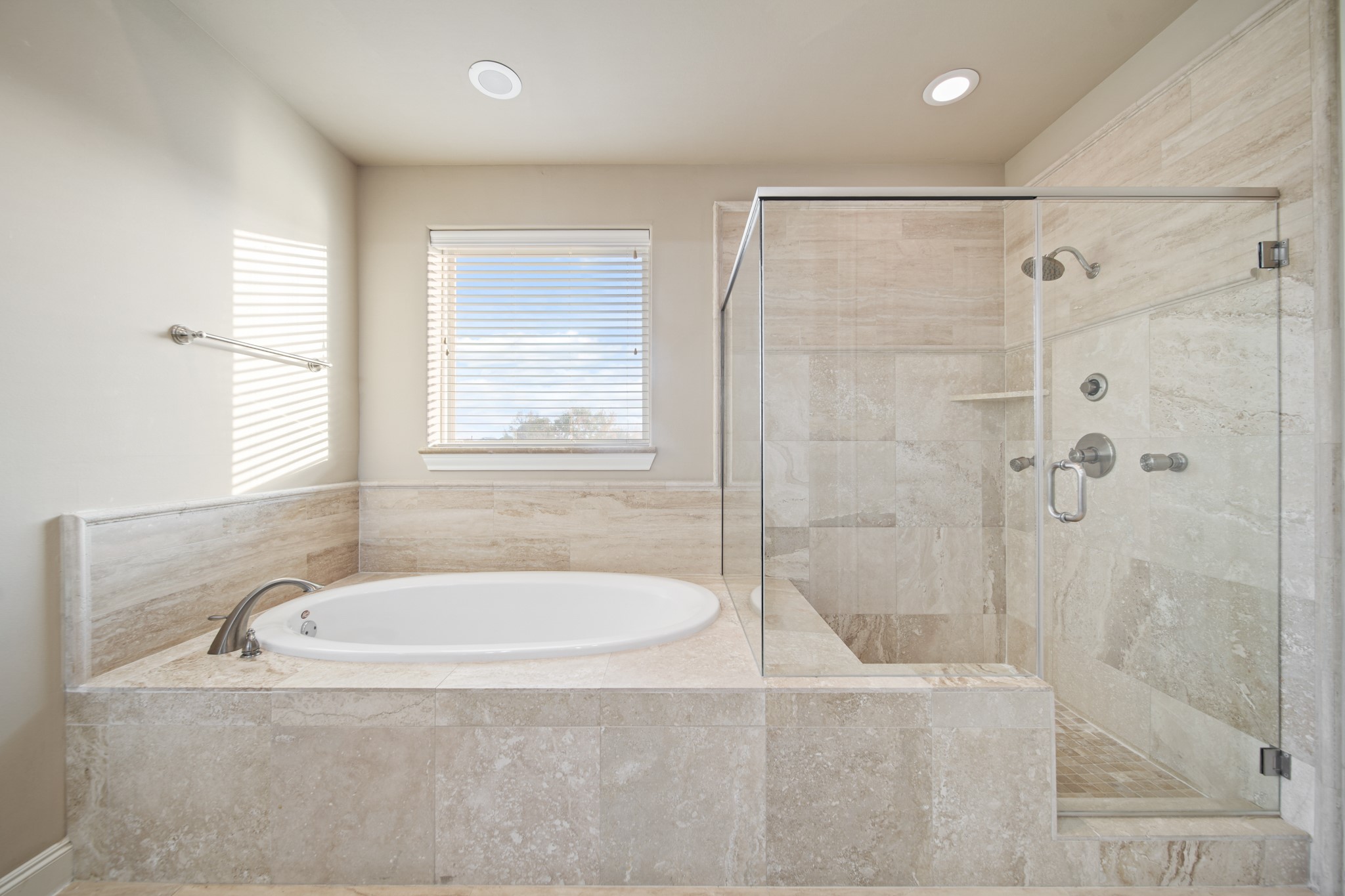 1250 West 23rd Street Houston, TX 77008 - Photo 34 of 50 It also enjoys a wonderful soaker tub and walk-in shower with bench!