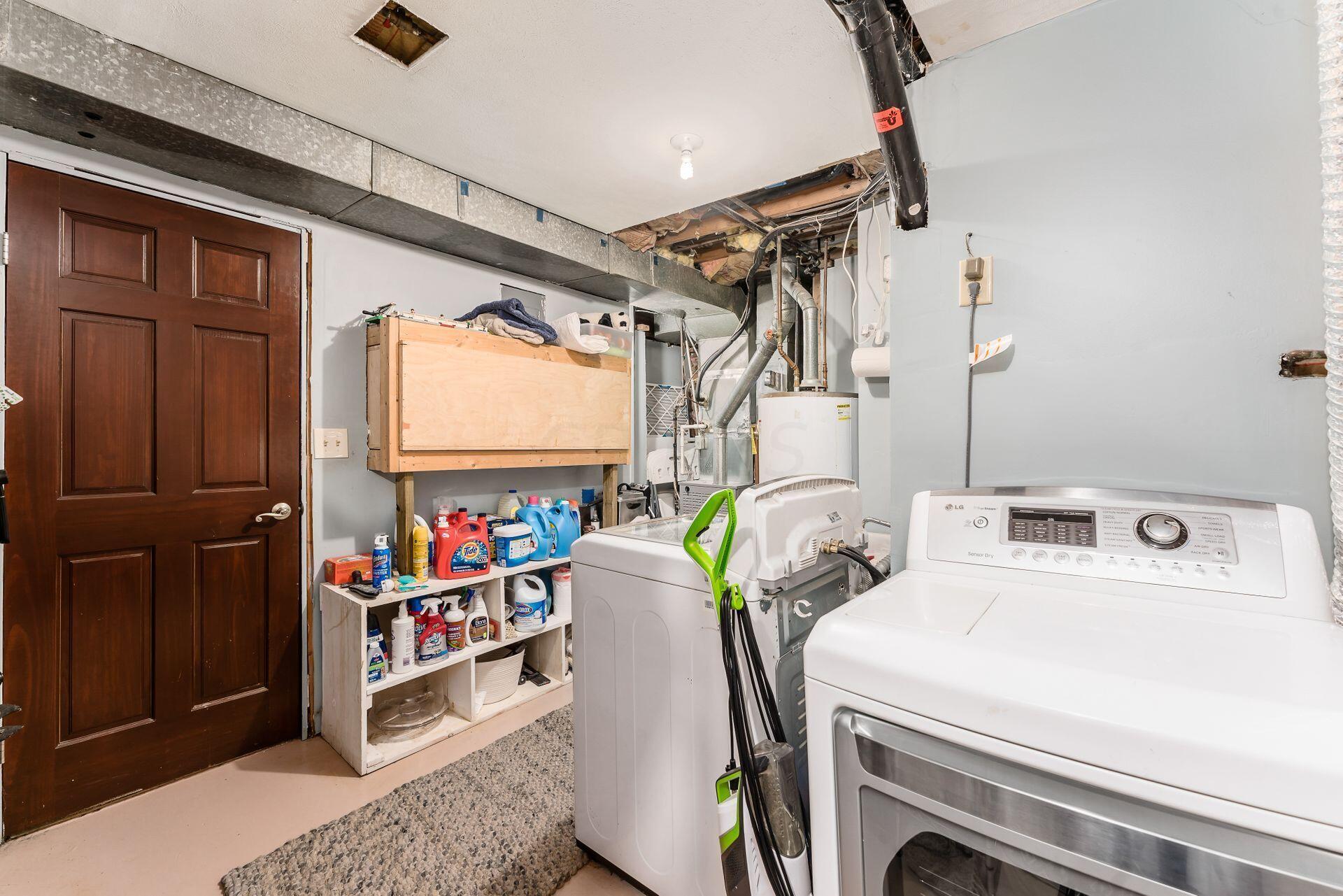 7080 Rieber Street Columbus, OH 43085 - Photo 33 of 55 Lower Level Laundry and utility space, with storage space around the corner!!