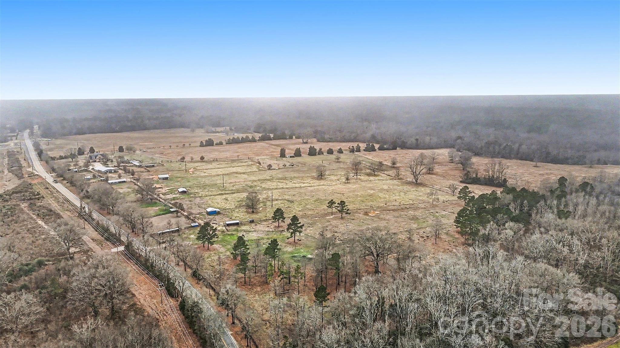 3135 Old Hickory Road Lancaster, SC 29720 - Photo 2 of 33 an view of a dry yard with wooden fence