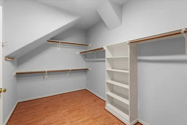 a view of an empty walk in closet