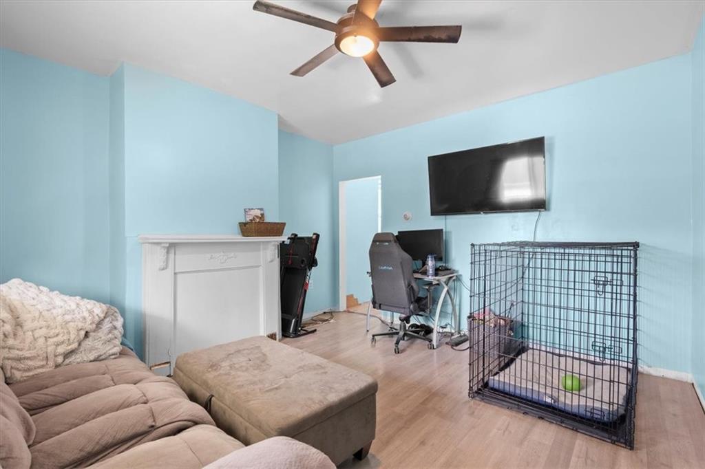 133 Owen Street McKees Rocks, PA 15136 - Photo 2 of 25 a living room with furniture and a flat screen tv