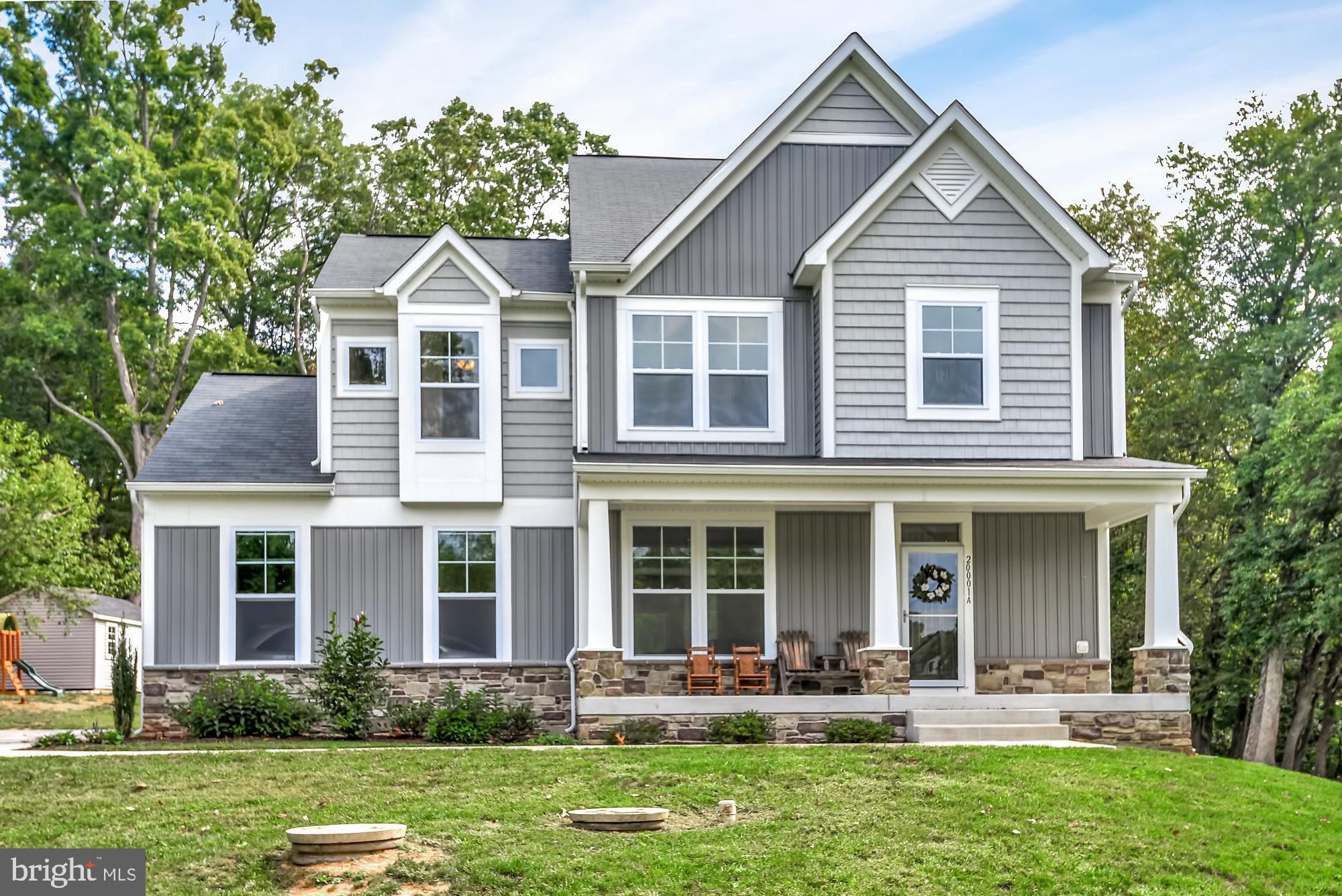 20001 Gunpowder Road Manchester, MD 21102 - Photo 1 of 28 Stone accents, batten board and modern trim