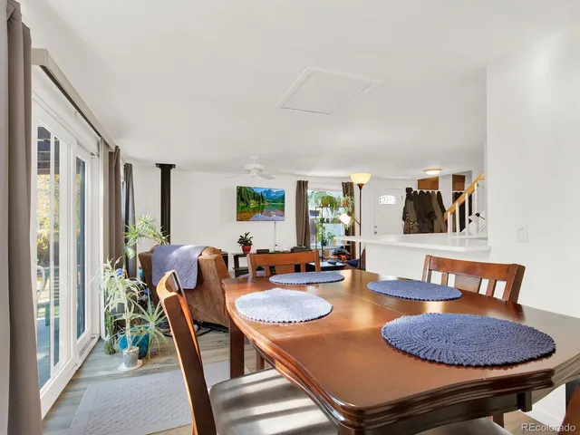 a kitchen with granite countertop a sink and cabinets