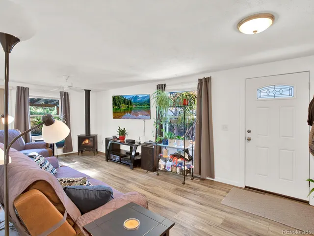 a living room with furniture and a couch