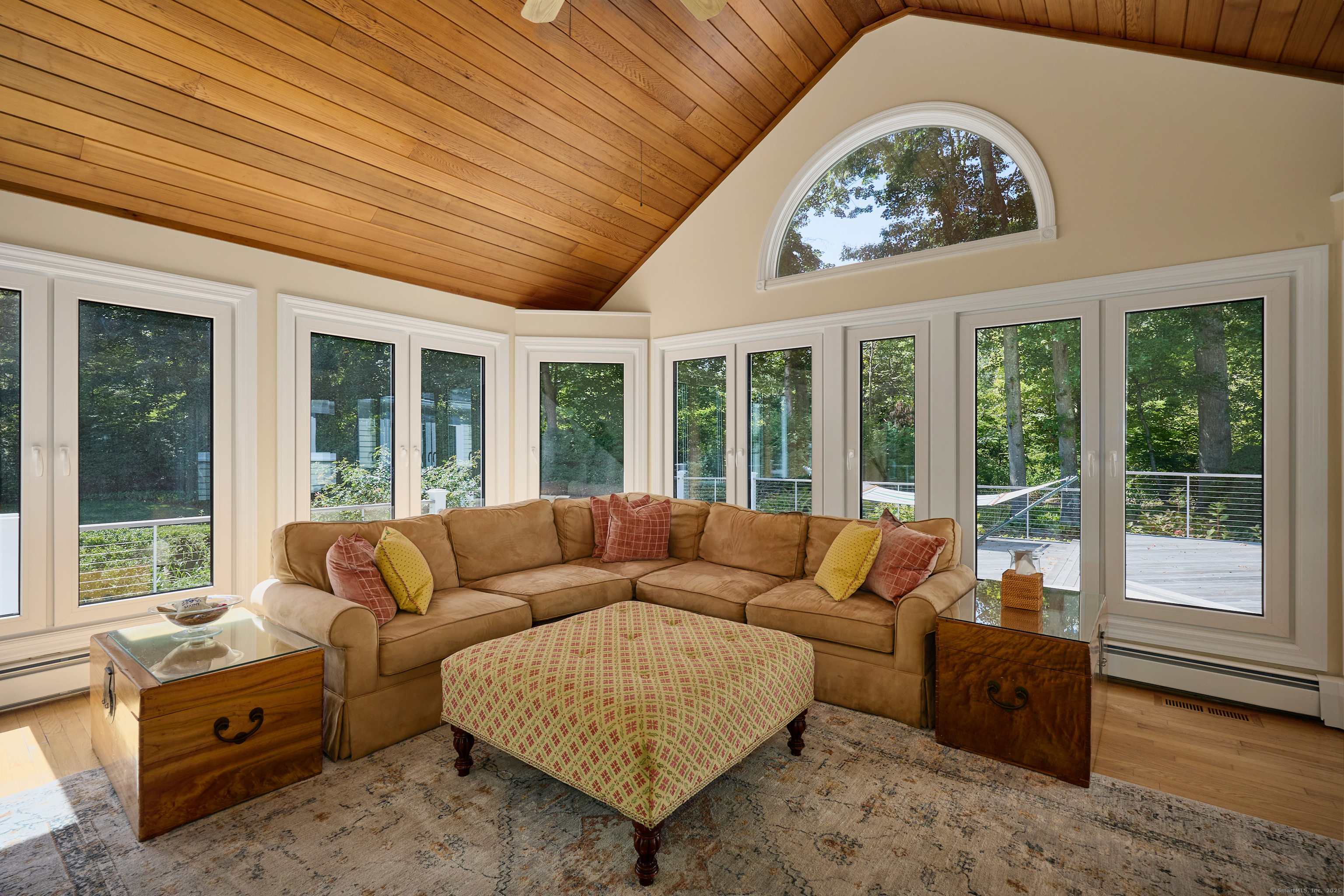 81 Norfield Road Weston, CT 06883 - Photo 13 of 40 a living room with furniture and large windows