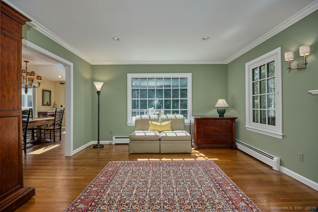 81 Norfield Road Weston, CT 06883 - Photo 28 of 40 a living room with furniture rug and window