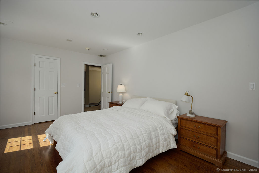 81 Norfield Road Weston, CT 06883 - Photo 38 of 40 a bedroom with a bed and a window
