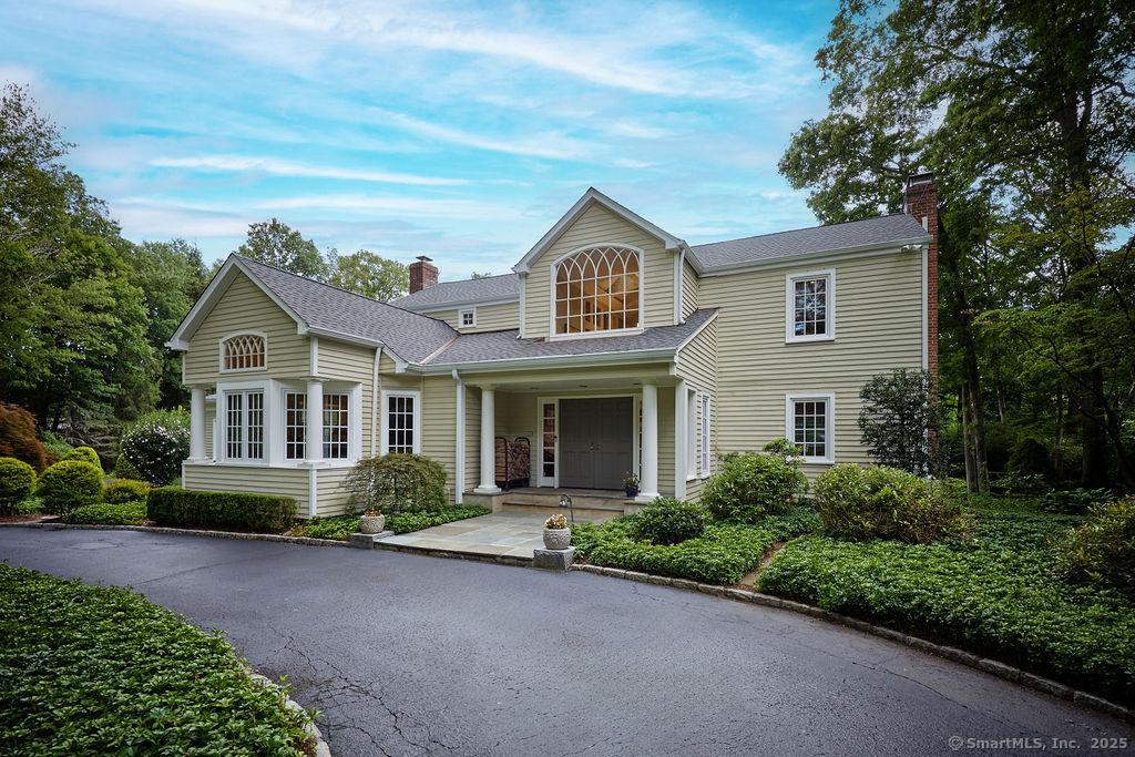 81 Norfield Road Weston, CT 06883 - Photo 39 of 40 a front view of a house with garden