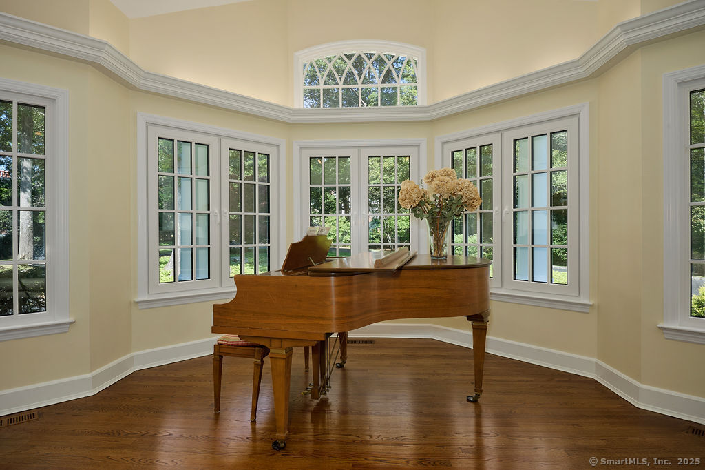 81 Norfield Road Weston, CT 06883 - Photo 6 of 40 a view of a dining room with furniture window and wooden floor