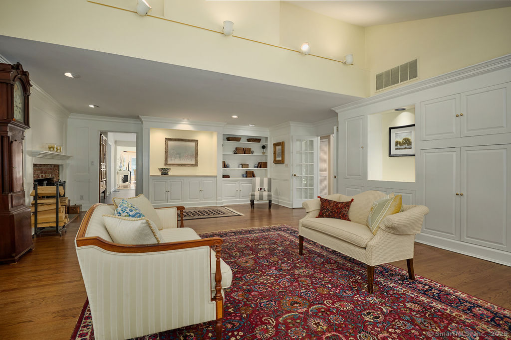 81 Norfield Road Weston, CT 06883 - Photo 8 of 40 a living room with furniture and wooden floor