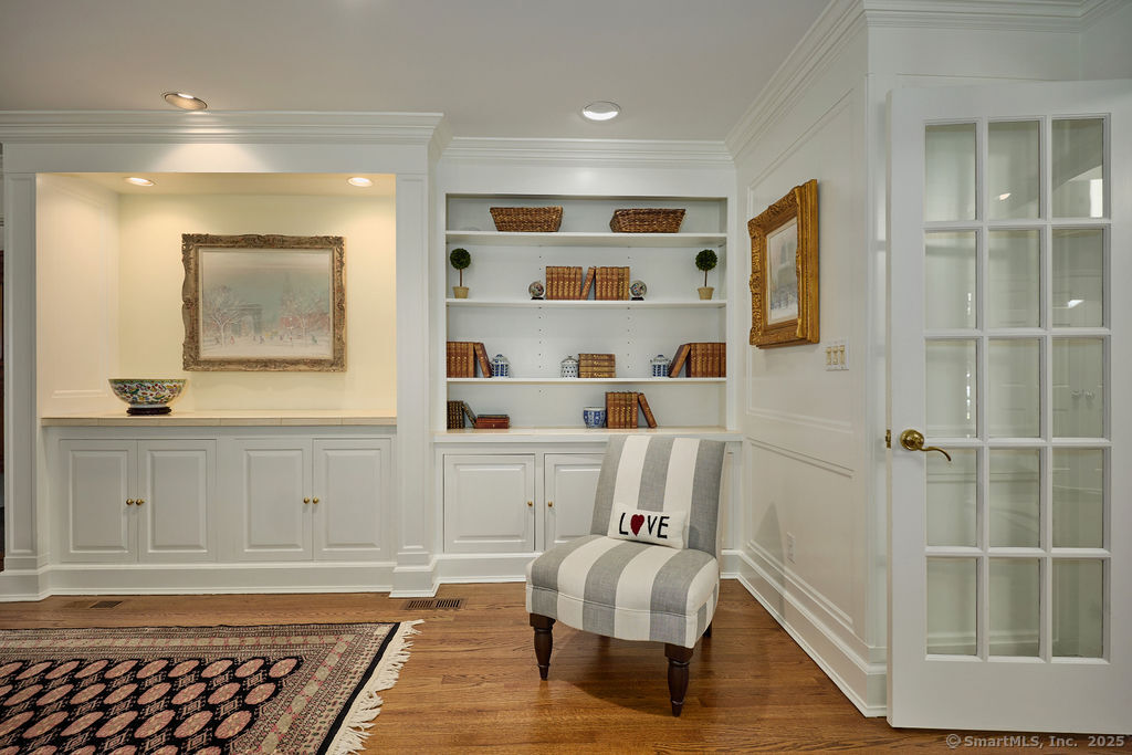 81 Norfield Road Weston, CT 06883 - Photo 9 of 40 a living room with furniture and a rug