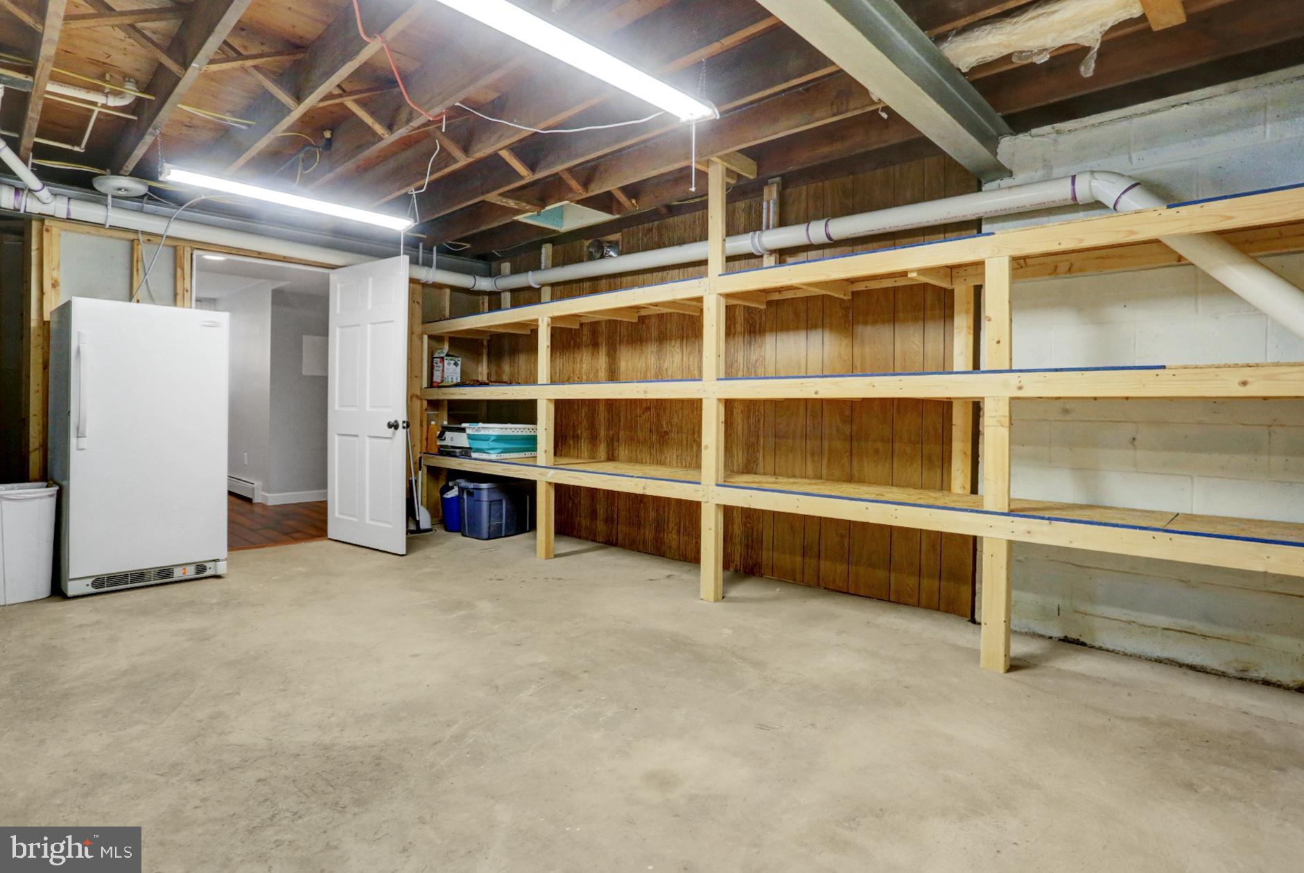 1454 Geigertown Road Birdsboro, PA 19508 - Photo 30 of 38 Built-in shelves in basement storage area