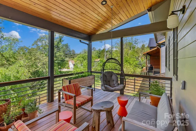 a view of a house with potted plants