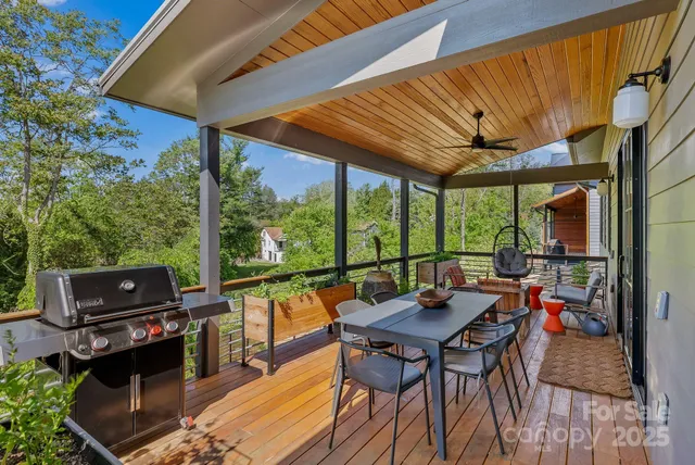 an aerial view of a building with a garden and trees